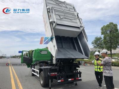 China Caminhão de lixo basculante com logotipo personalizado selado em cores Caminhão de lixo automático 7cbm 7m3 à venda