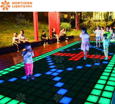 China Jumping Grid Game Super Grid Led Dance Floor Tile For Entertainment Te koop