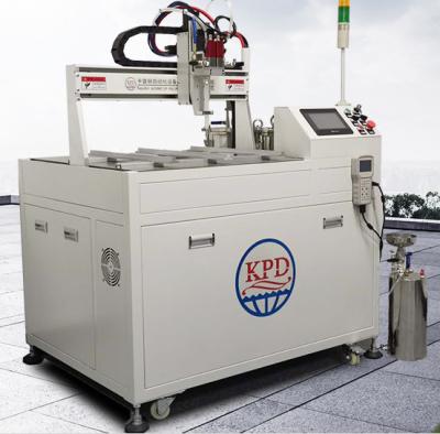 China Máquina de embotellamiento de condensador con 2 componentes PU Dispensador de resina epoxi y 260KG de peso en venta