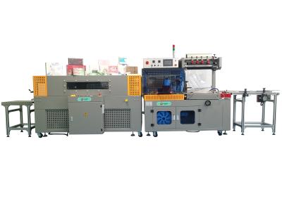 China 18KW PLC Programmed Heat Shrink Film Packaging Machine Automatic for sale