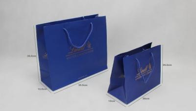 China C1S C2S Glossy Coated Personalized Paper Bags Sea Blue Garment Shopping Paper Bags for sale