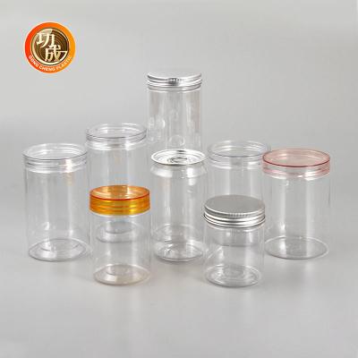 China Transparent PET Candy Cookie Jar 450ml 500ml Plastic Candy Jars With Lids for sale