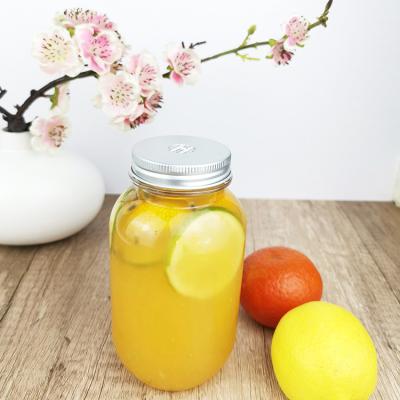 China Beverages 0.5 Liter Plastic Storage Jars With Caps Clear Round Juice Containers for sale