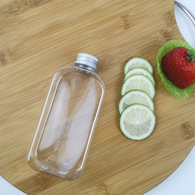 China Flache Wasser-Flaschen Winkel- des Leistungshebels300ml mit Kappen Juice Milk Plastic Smoothie Bottles zu verkaufen