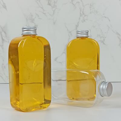 China 400ml PLA Flat Water Bottles With Caps Clear Beverages for sale