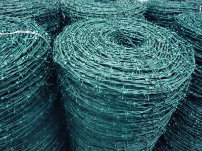 China Iron PVC Coated Twisted Barbed Wire RAL 6005 for sale