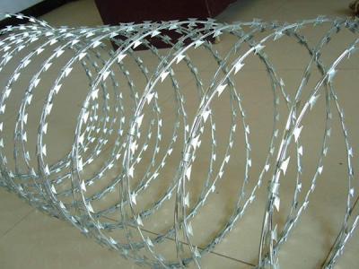 China Galvanized Steel High Tensile Barbed Wire Bto 22 Spiral Blade 14 Gauge for sale