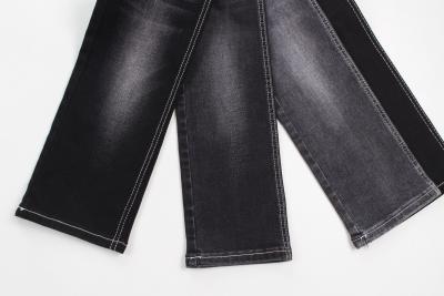 Chine Hot sell   10 oz  warp slub  high stretch  black backside woven  denim fabric  for jeans à vendre