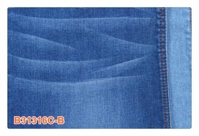 China Jeans 10.8oz 97% Ctn 3% Lycra Cotton Spandex Denim Fabric Soft Jean Material for sale
