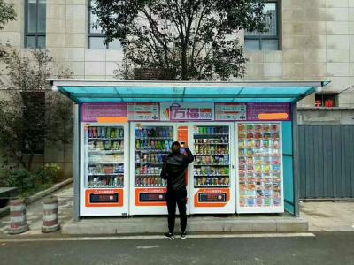 China Mini Market Vending Machine Combination en línea con el ODM de la pantalla de 5 pulgadas en venta