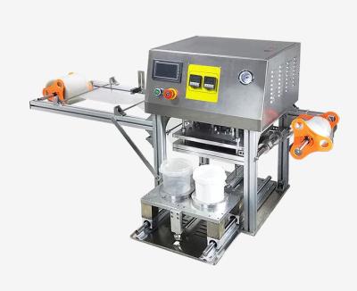 China Glas-Eimer-Dichtungs-Maschine mit 1600 Pcs/h automatische für verpackende Nahrungsmittelsoße und tägliche chemische Produkte zu verkaufen