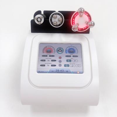 China L Handle Touch Screen 1.2MHz Radio Frequency Machine Shrink Fat Cell All Body Parts for sale