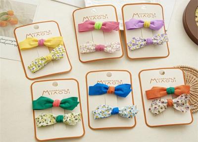 China ins DIY girls accessories sweet floral fabric irregular bow duck mouth clip cute girl candy hair clip for sale