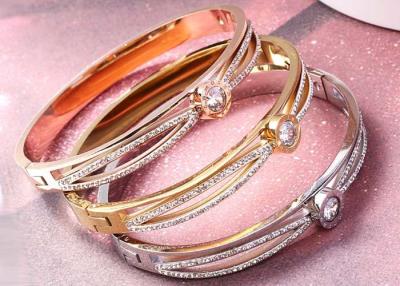 China Bracelet female gift 18K gold letter Naan zircon jewelry stainless steel cross gold bracelet wholesale for sale