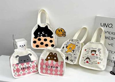 China DIY drawing Japanese cartoon cute cat canvas bag Wave dot milk tea handbag carrying hand pull bag logo words for sale