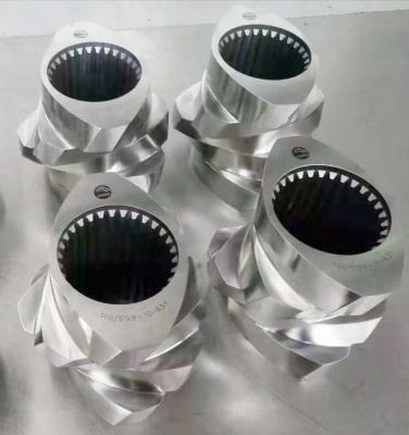China elementos de máquina especiais da extrusora de parafuso do gêmeo da resistência de corrosão 316L TKD que amassam o bloco à venda