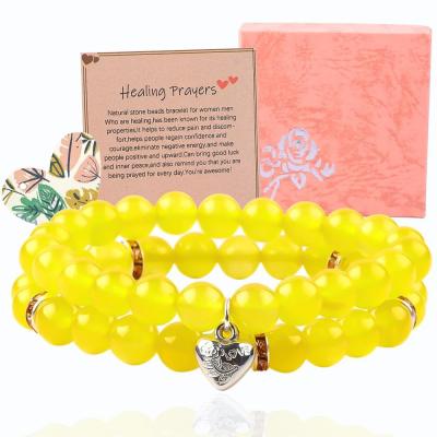 China Elastico redondo 8 mm Perlas de piedras preciosas de jade amarillo pulseras de cristal OEM ODM en venta