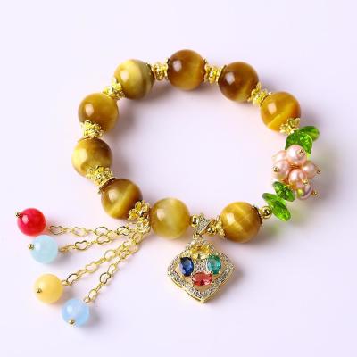 China Healing Power 10mm Gemstone Beaded Round Bracelets With Beautiful Charms for sale