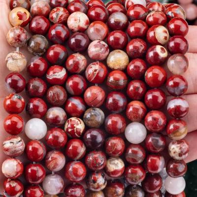 China Cristal natural pulido de jaspe rojo y perlas de piedra preciosa de 8 mm para joyería única DIY en venta