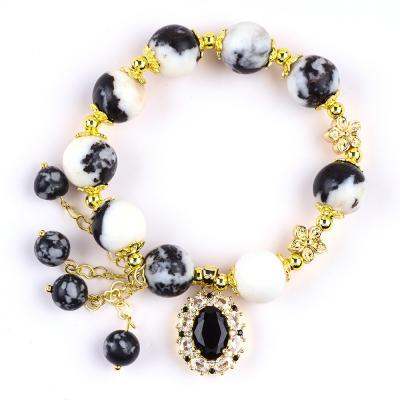 Chine 12 mm Zèbre Noir et Blanc Jasper Bracelets de perles de guérison pour la méditation à vendre