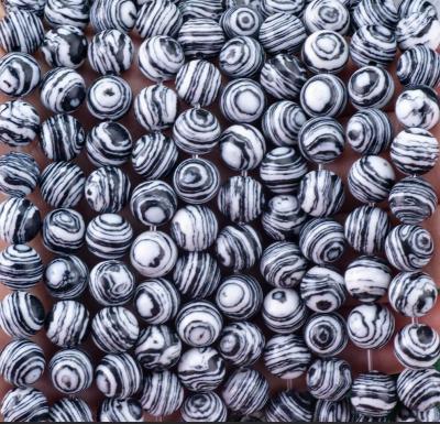 China Pedra semi-preciosa sintética Zebra Malaquita Filamentos de contas soltas Branca e preta Pedra semi-preciosa para fabricação de jóias DIY à venda