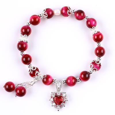 China 8mm Round Stone Rose Red Tiger'S Eye Beaded Stretch Bracelet for sale