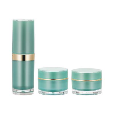 China Empty Cosmetic Round Plastic Acrylic Packaging Container Cream Jar Lotion Bottle Set for sale