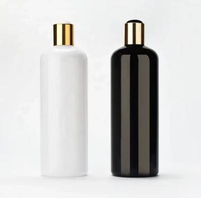 China HAUSTIER fertigte Plastikshampoo-Flasche mit Goldschwarze weiße Disketten-Spitzenkappe besonders an zu verkaufen