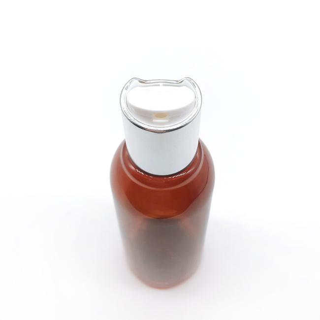 白いプラスチック上が付いている24/410の銀製/金のアルミニウム ディスク上の帽子