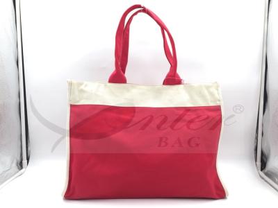 China Red Canvas Travel Tote Bags Slides Over Luggage Handle Customized Logo for sale