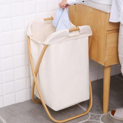 China Household Essentials Oem Bamboo Laundry Hamper Basket Collapsible X Frame for sale