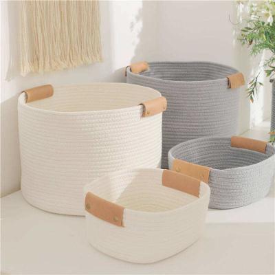 China Decorative Containers KingWell Handwoven Storage Basket With Leather Handles for sale