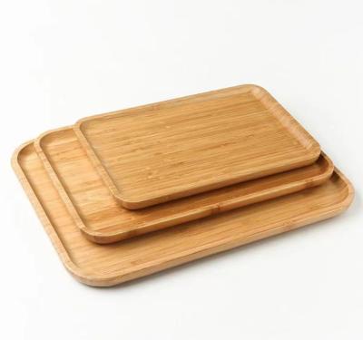 China Renewable Bamboo Rectangular Tray , Natural Wooden Food Plate Raised Edge Design for sale