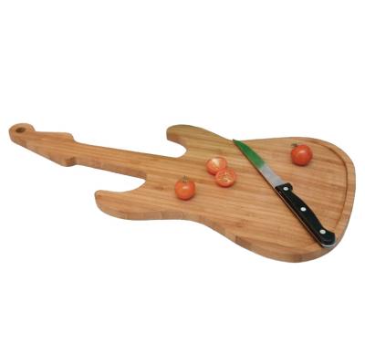 China Household 8.6 X 0.6 X 19.4 Inches Bamboo Kitchen Cutting Boards Guitar Shape Wooden for sale