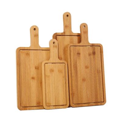 China Oem Bread 4pcs Set Large Bamboo Cutting Board With Handle for sale