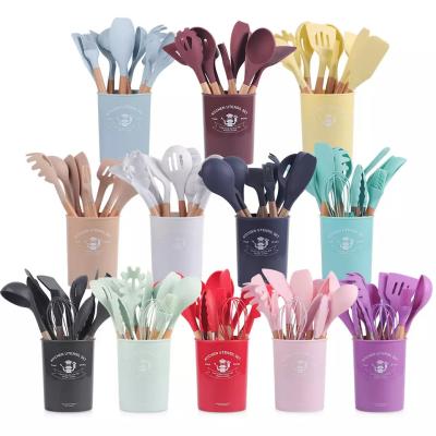 China Kitchenware Silicone Cooking Tools 12 Pieces In 1 Set With Wooden Handles for sale