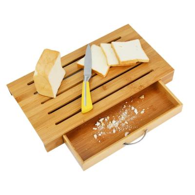 China Bamboo Water Resistance Baguette Bread Board Cutting With Tray Drawer for sale
