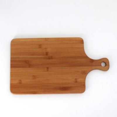 China Acacia Wood Bamboo Butcher Block Juice Groove Cutting Board With Handles for sale