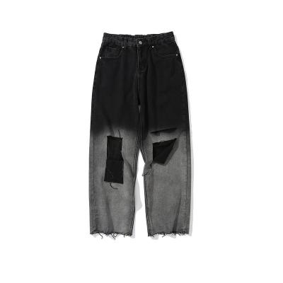 China OEM MOQ 100pcs Black Ripped Jeans Fashion Men's Loose Pants Denim Manufacturer for sale