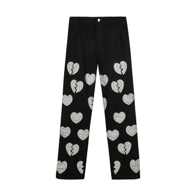 China Pantalones anchos del remiendo del OEM de la pierna recta de gran tamaño negra en forma de corazón unisex de los vaqueros en venta