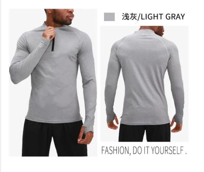China Men Sport Wear Polyester Spandex Half Zipper front Jacket Long Sleeve for sale