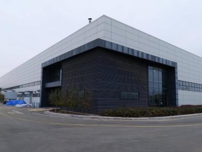 China Edificio administrativo de estructura de acero versátil con pisos de concreto para edificios industriales en venta