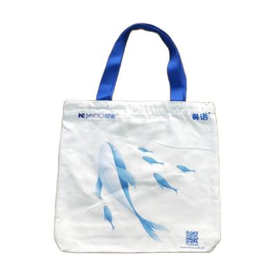 China Full Printing Cross Stitched PP Woven Shopping Bag with Mesh Pocket à venda