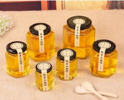 China kitchen products round and hexagonshape canned goods galss jar honey jam jar storage bottle jars for sale