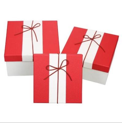 China Rectangle shape logo customized paperboard storage box for different gift with Ribbon Red and White style for sale