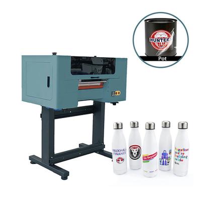 China Máquina de transferência automática de DTF de laminação Máquina de impressão de DTF UV a jato de tinta F1080 XP600 cabeça à venda