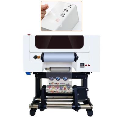 China Impressora DTF UV de 30 cm de tamanho econômico Impressora Roll To Roll com duas cabeças XP600 à venda