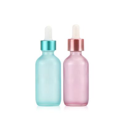 China Semi Transparent Blue Pink Glass Dropper Empty Essential Oil Bottle 30ml for sale