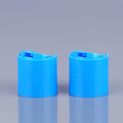 China Blue 24mm Disc Top Cap Polypropylene Shampoo Bottle Cap for sale