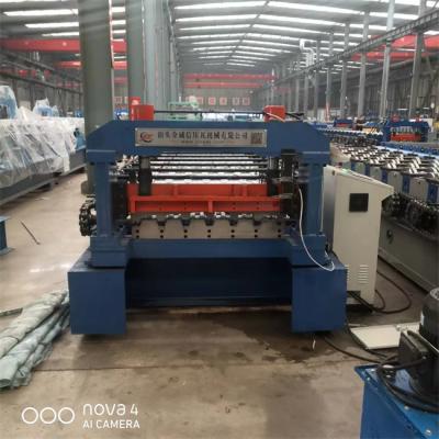 China Galvanized Steel Decking Floor Roll Forming Machine PLC System for sale